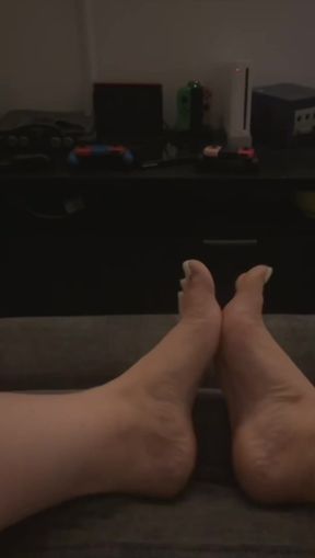 Teasing feet in a foot fetish video
