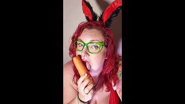 Naughty chubby bunny and her carrot