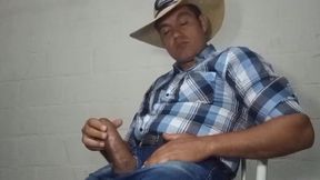 Hunky cowboy takes his giant dick in hand for a hot solo session
