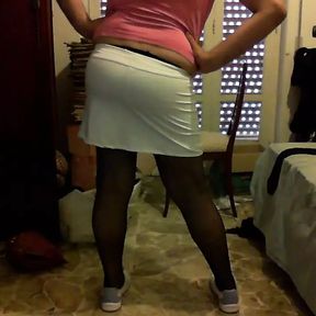 Crossdresser with tennis skirt and shoes