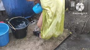 Indian house bhabhi bathing outside