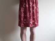 Sissy in chastity cage under long skirt