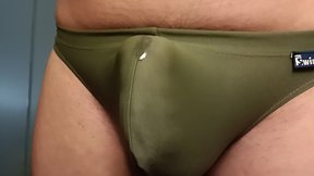 Or teenerotic green speedo excitement: cant wait to cum and mess in my bulge!