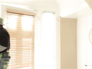 Tennis player couldn't resist playing with that large ebony weenie