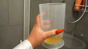 Slave girl gulps down every drop of her Mistress's pee