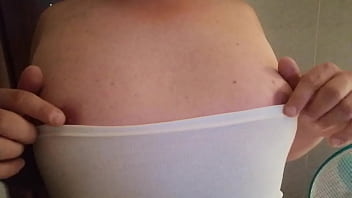 Touching and slowly showing my hard horny nipples