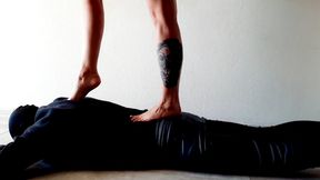 Foot mat for Dominatrix Nika. Trampling the body of a slave.