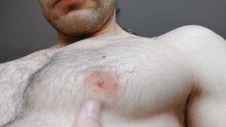Close-up nipples and armpit of hairy daddy