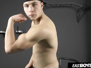 EastBoys Straight athlete Randall White jerks off his knob during the time that working out and flexing his muscles on a chair