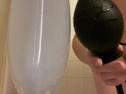 Young Sissy Inserts Massive Inflatable Butt Plug