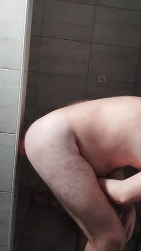 a man puts his anus on a dildo
