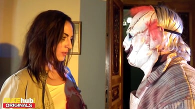 Miky Love as a tattooed brunette submits to a bearded man's big cock in a horror-themed encounter