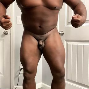 Big black muscle flexing