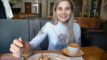 Pretty blonde Letty Black gets off on her remote controlled vibe in crowded cafe