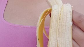 beautiful girl eating a banana