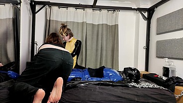 When there's this much bondage, a very warm day and lots of slippery lubed up latex, getting out of it all again is quite the...