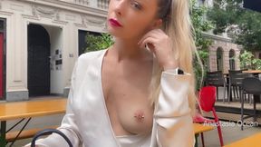 Slut with pierced nipples flashing her tits in public