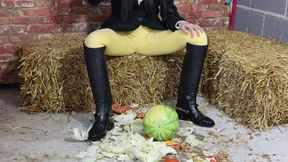 Horny Slut Equestrian Louisa crushing fruit wearing boots