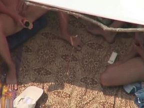 Nude and horny on the beach