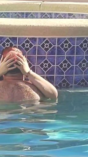 Hot Long Haired Ginger MILF Taking a Dip and Fucking in Outdoor Pool