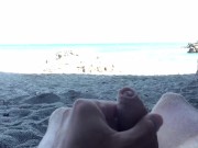 Slow motion cumshot on public beach