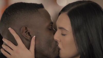 Striking brunette deepthroats a massive black dick before being ravaged