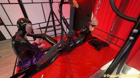 Mistress Performs Milking Test on Latex Slave