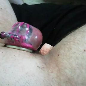 Slave Adashah locked in a tiny chastity. Fucked in the ass with a large vibrator and masturbated with small vibrators