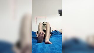 hooded lad flashing his nude soles