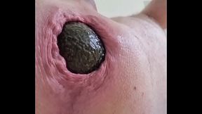 Self-fist, bizarre objects and balls in ass