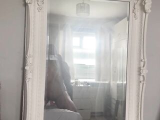 Riding myself with my sex toy in front of mirror