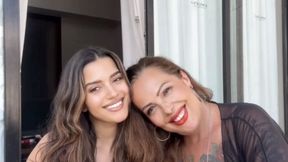 Stepmother and stepdaughter smoking Marlboro reds in their suite in Punta Cana, wearing beachwear!