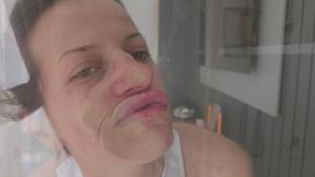 Funny faces against a door glass 8K