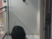 Crossdresser takes a smoke break while cuffed