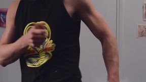 Muscular Young Guy Ripping up Plush giraffe