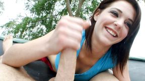 ”Mesmerizing babe gives handjob for some cum”