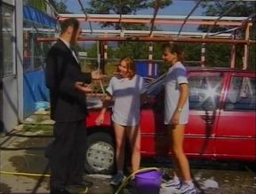 Brunette teens interviewed while car washing