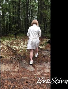 pissing standing in the forest by the road