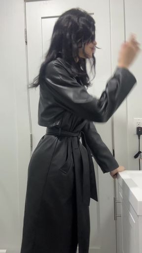 Woman in leather coat