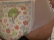 Diaper boy rides K9 dildo in a goodnights diaper