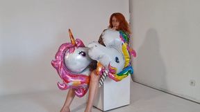 blow two unicorns with her mouth