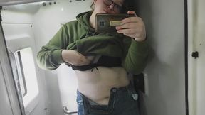 Molly shows it all in the bus bathroom