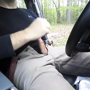 Horny so I pull the car over and jerk-off in a parking lot. I cum, get out and pull up my pants