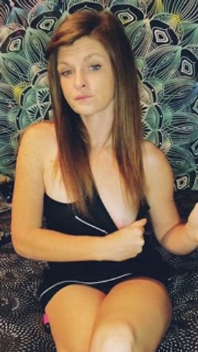 Sexy redhead smoking and showing off perfect tits