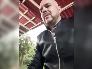 Wearing sexy leather, jerking of with two codoms on, and cuming a masive load