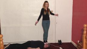 High-Heeled Babe Dances and Tramples Slave's Head Fetish