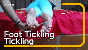A woman lying face down and tied up is having her feet tickled (1)