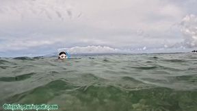Carissa snorkeling in the Pacific Ocean in the hibiscus bikini