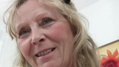 Chubby mature woman gets horny and masturbates on the couch