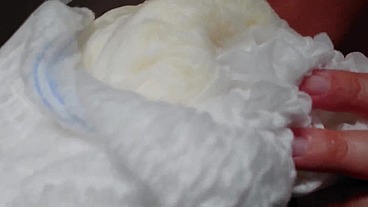 Big diaper full of pee in a public place